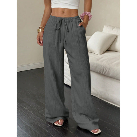 Casual solid color textured fabric knotted waist diagonal pocket wide leg pants m302809